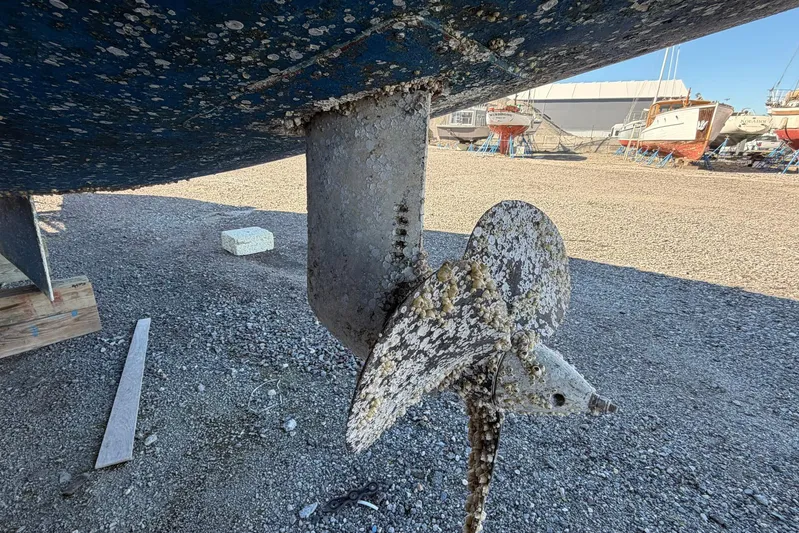 Gratitude Yacht Photos Pics Barnacle-covered propeller of a 2015 Leopard 48 catamaran on dry dock.