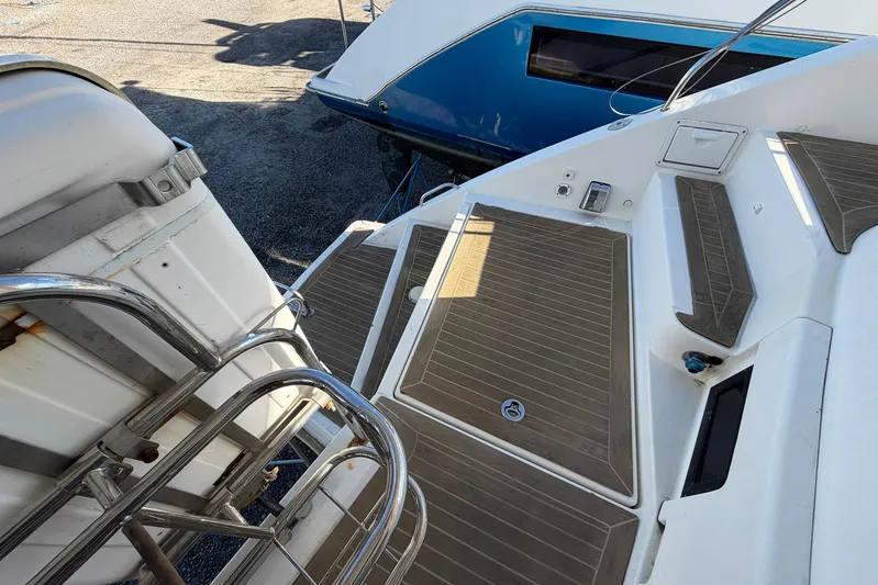 Gratitude Yacht Photos Pics 2015 Leopard 48 yacht deck with stainless steel railings and wooden flooring.