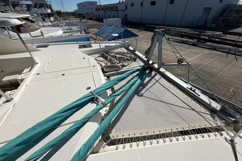 Gratitude Yacht Photos Pics Deck view of a 2015 Leopard 48 catamaran in a marina setting.