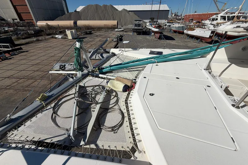 Gratitude Yacht Photos Pics 2015 Leopard 48 catamaran on dry dock, showcasing deck and rigging details.
