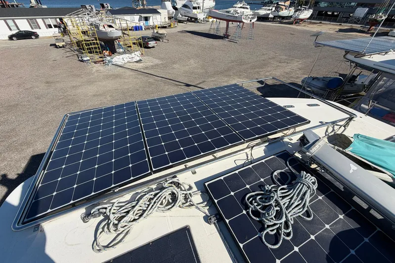 Gratitude Yacht Photos Pics Solar panels on 2015 Leopard 48 yacht in a marina setting.