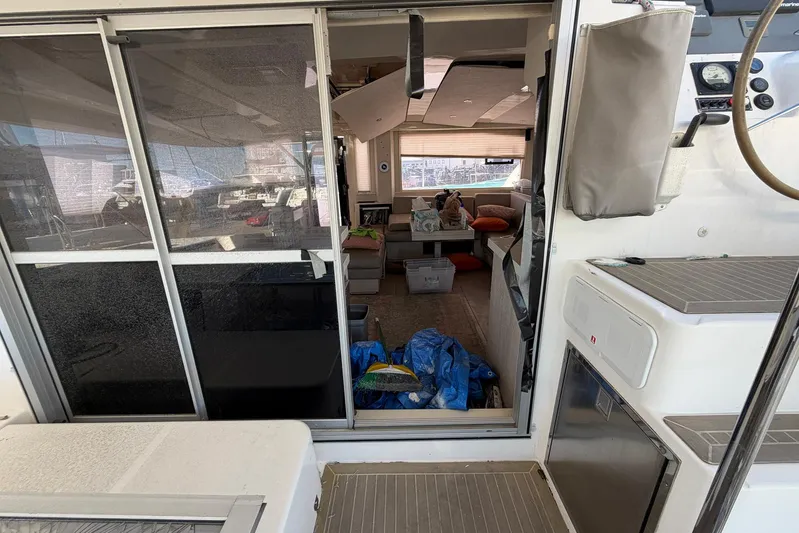 Gratitude Yacht Photos Pics Interior view of a 2015 Leopard 48 yacht, showcasing the living area and cockpit.