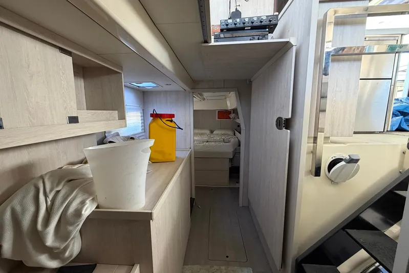 Gratitude Yacht Photos Pics Interior of 2015 Leopard 48 yacht with modern furnishings and storage space.