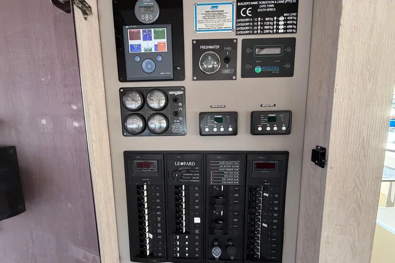 Gratitude Yacht Photos Pics Control panel of a 2015 Leopard 48 yacht with various gauges and switches.