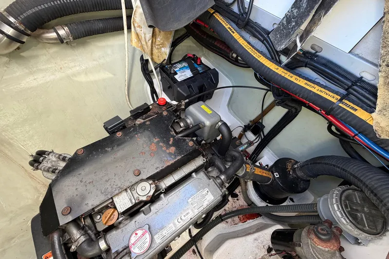 Gratitude Yacht Photos Pics Engine compartment of a 2015 Leopard 48 yacht with visible components and wiring.