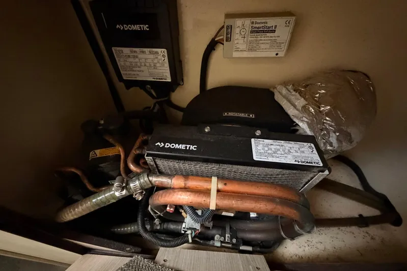 Gratitude Yacht Photos Pics Dometic air conditioning unit in a 2015 Leopard 48 yacht, featuring copper piping and SmartStart II.