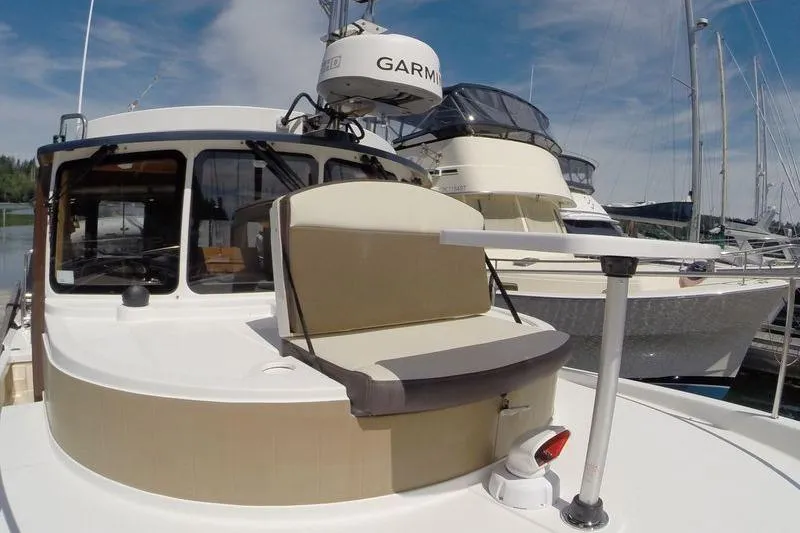 Mi Callao Yacht Photos Pics 2015 Ranger Tugs R-31S boat with Garmin radar, docked at marina.