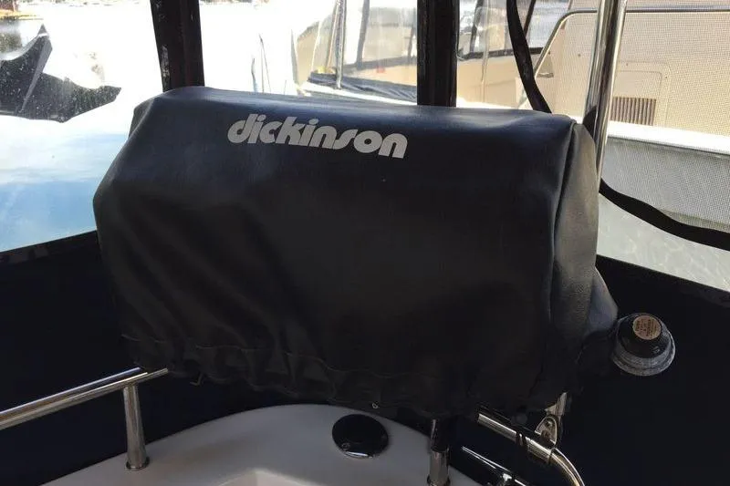 Mi Callao Yacht Photos Pics 2015 Ranger Tugs R-31S boat with Dickinson grill cover on deck.