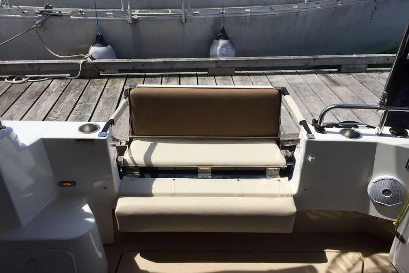 Mi Callao Yacht Photos Pics 2015 Ranger Tugs R-31S boat seating area with dock view.