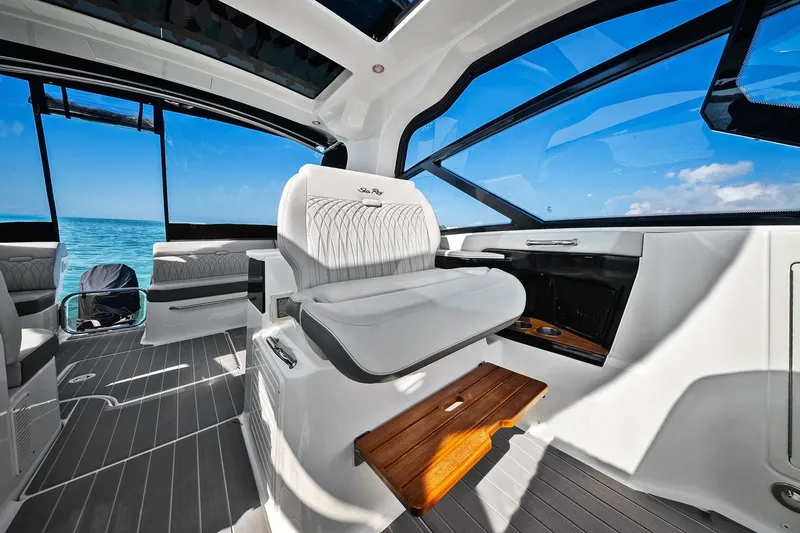  Yacht Photos Pics 2023 Sea Ray Sundancer 370 Outboard interior with luxurious seating and ocean view.