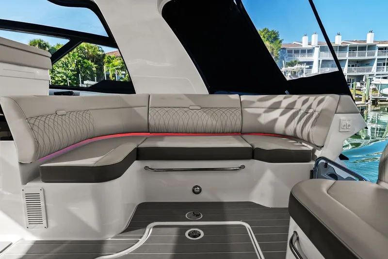  Yacht Photos Pics 2023 Sea Ray Sundancer 370 Outboard interior with luxurious seating and modern design.