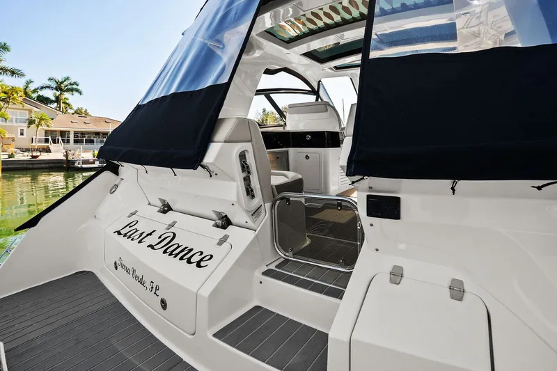  Yacht Photos Pics 2023 Sea Ray Sundancer 370 Outboard yacht docked, featuring sleek design and luxurious interior.