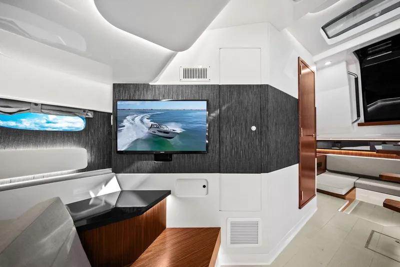  Yacht Photos Pics Interior of 2023 Sea Ray Sundancer 370 Outboard, featuring modern design and entertainment system.