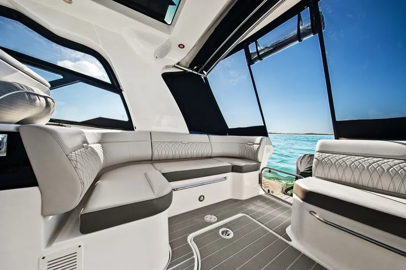  Yacht Photos Pics Luxurious interior of 2023 Sea Ray Sundancer 370 Outboard with ocean view.