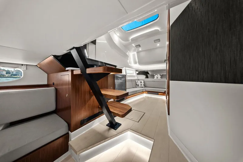  Yacht Photos Pics Luxurious interior of 2023 Sea Ray Sundancer 370 Outboard with modern design and elegant lighting.