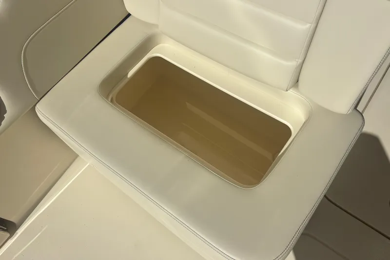  Yacht Photos Pics 2026 Scout 255 Dorado boat seat with built-in storage compartment.