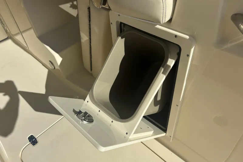  Yacht Photos Pics Storage compartment on 2026 Scout 255 Dorado boat, featuring sleek design and functionality.