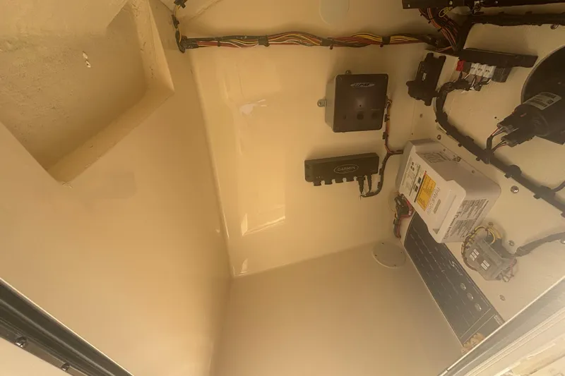  Yacht Photos Pics Electrical components inside a 2026 Scout 255 Dorado boat compartment.