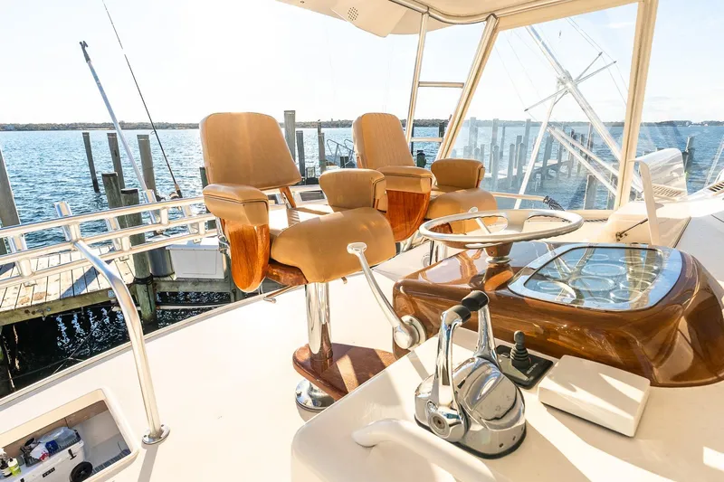 Geaux Time Yacht Photos Pics 2002 Viking 52 Convertible yacht helm with leather seats and ocean view.