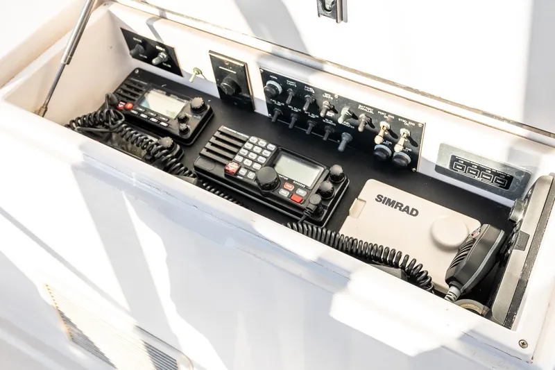 Geaux Time Yacht Photos Pics Control panel of a 2002 Viking 52 Convertible yacht with communication equipment.