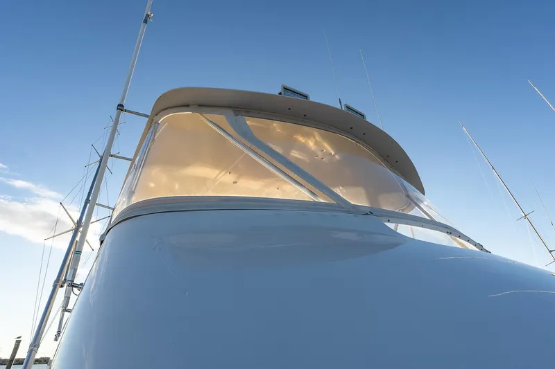 Geaux Time Yacht Photos Pics 2002 Viking 52 Convertible yacht, close-up view of the bridge against a clear sky.