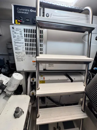 Wendy Ann Yacht Photos Pics Engine room of 2021 Albemarle 41 Express with Cummins Onan generator and ladder.