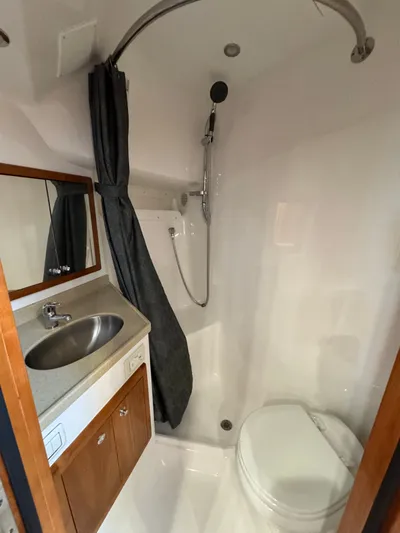 Wendy Ann Yacht Photos Pics 2021 Albemarle 41 Express bathroom with shower, sink, and toilet.