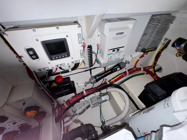 Wendy Ann Yacht Photos Pics Engine room of 2021 Albemarle 41 Express with electrical components and wiring.
