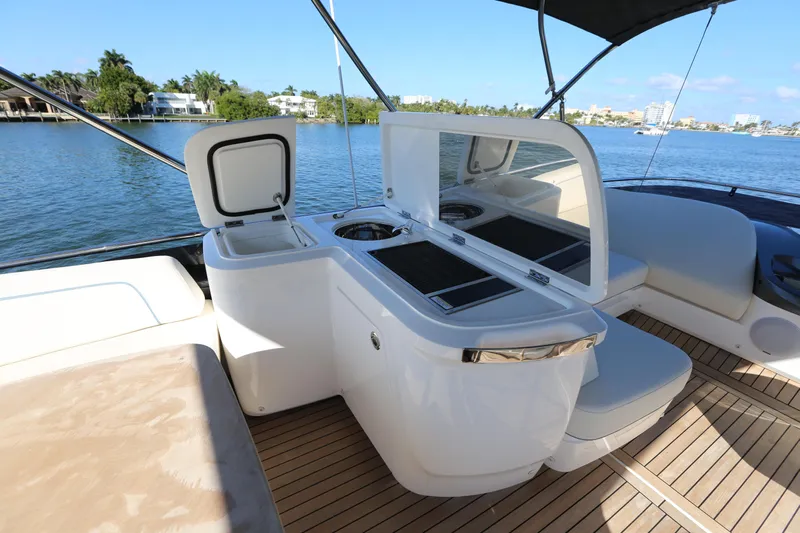 Ytf 002 Yacht Photos Pics 2024 Princess F45 yacht deck with outdoor kitchen and scenic water view.