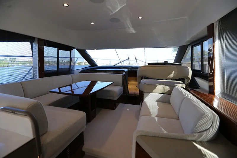 Ytf 002 Yacht Photos Pics Luxurious interior of 2024 Princess F45 yacht with elegant seating and panoramic windows.