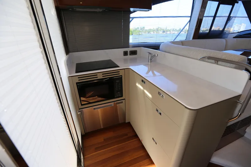 Ytf 002 Yacht Photos Pics 2024 Princess F45 yacht kitchen with modern appliances and sleek design.