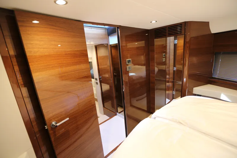 Ytf 002 Yacht Photos Pics Luxurious interior of 2024 Princess F45 yacht with polished wood finishes.