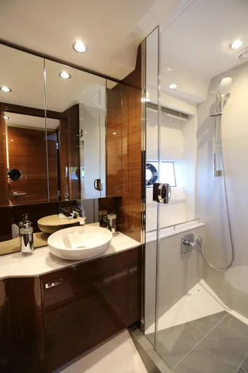 Ytf 002 Yacht Photos Pics Luxurious bathroom in 2024 Princess F45 yacht with modern fixtures and elegant design.