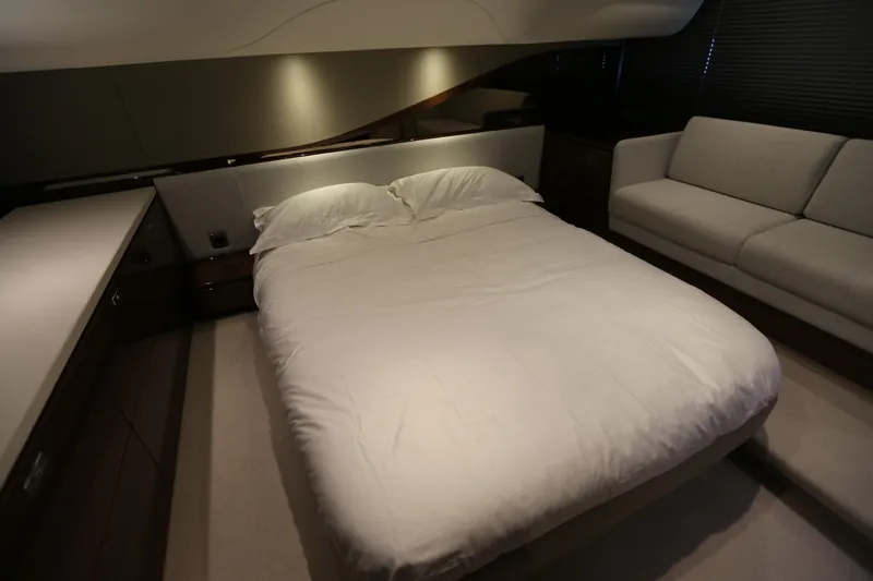 Ytf 002 Yacht Photos Pics Luxurious bedroom interior of 2024 Princess F45 yacht with elegant bedding and modern design.