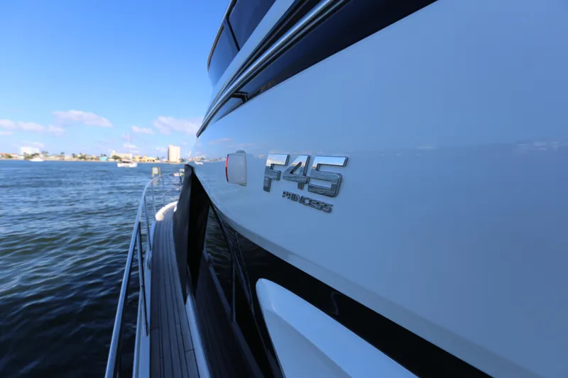 Ytf 002 Yacht Photos Pics 2024 Princess F45 yacht on water, showcasing sleek design and branding.