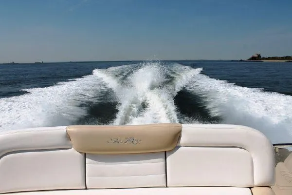 Blue Aye Yacht Photos Pics Sea Ray 330 Sundancer 2008 cruising on open water, view from the back seat.