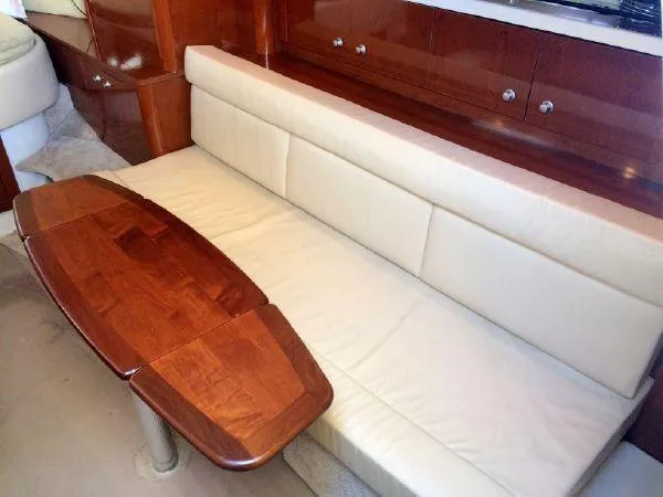 Blue Aye Yacht Photos Pics Interior seating and table of 2008 Sea Ray 330 Sundancer yacht.