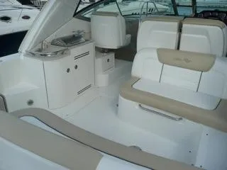 Blue Aye Yacht Photos Pics 2008 Sea Ray 330 Sundancer boat interior with white and beige seating.