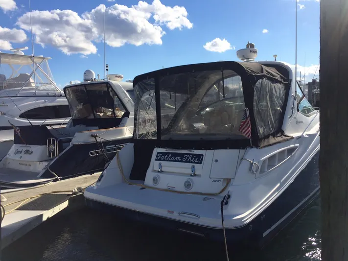 Blue Aye Yacht Photos Pics Sea Ray 330 Sundancer 2008 docked at marina under blue sky.
