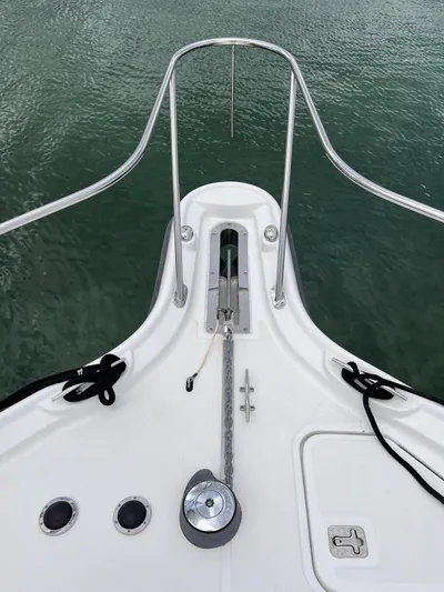  Yacht Photos Pics 2005 Tiara Yachts 3200 Open bow with anchor and railing.