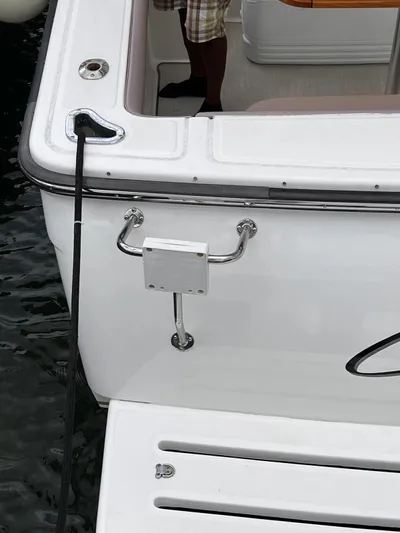  Yacht Photos Pics 2005 Tiara Yachts 3200 Open stern view with swim platform and dock line.