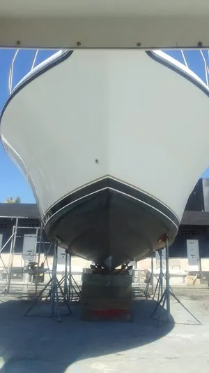  Yacht Photos Pics 2005 Tiara Yachts 3200 Open on dry dock for maintenance.