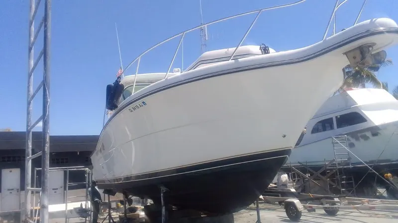  Yacht Photos Pics 2005 Tiara Yachts 3200 Open on dry dock for maintenance.