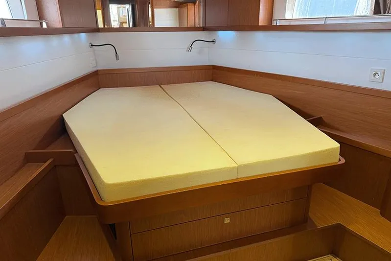  Yacht Photos Pics Interior cabin of 2013 Beneteau Sense 55 yacht with a comfortable bed.