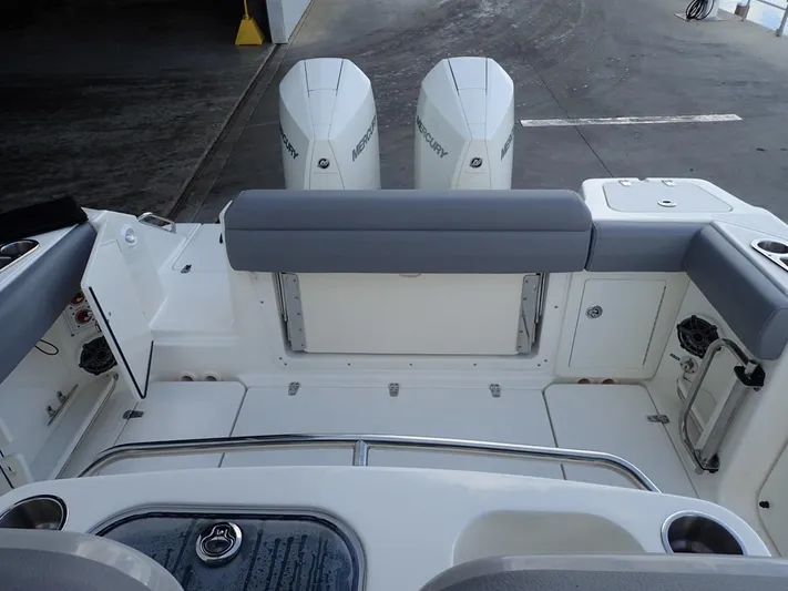  Yacht Photos Pics 2023 Boston Whaler 280 Outrage boat interior with dual Mercury engines.