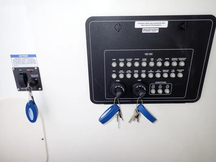  Yacht Photos Pics Control panel of a 2023 Boston Whaler 280 Outrage with keys and switches.