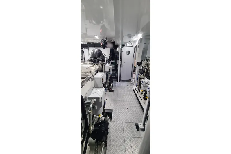  Yacht Photos Pics Engine room of 2022 Princess Y85 yacht, showcasing machinery and equipment.