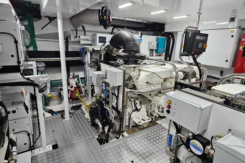  Yacht Photos Pics Engine room of 2022 Princess Y85 yacht, featuring advanced machinery and equipment.