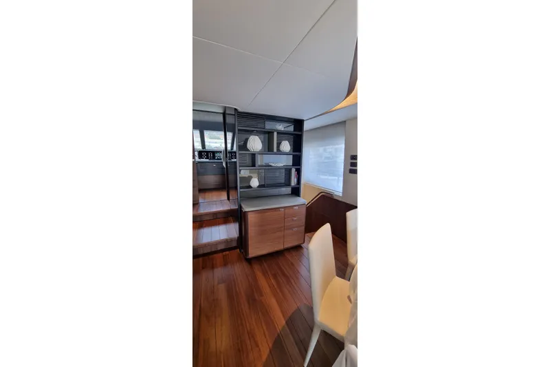  Yacht Photos Pics Luxurious interior of 2022 Princess Y85 yacht with elegant wood flooring and modern decor.