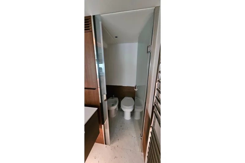  Yacht Photos Pics Modern bathroom in 2022 Princess Y85 yacht with toilet and bidet.